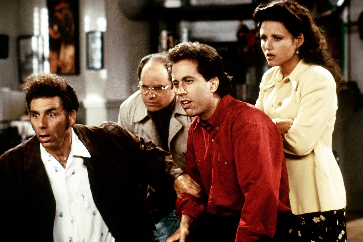 Image may contain Colin Farrell Julia LouisDreyfus Human Person Clothing Apparel Jason Alexander and Bar Counter