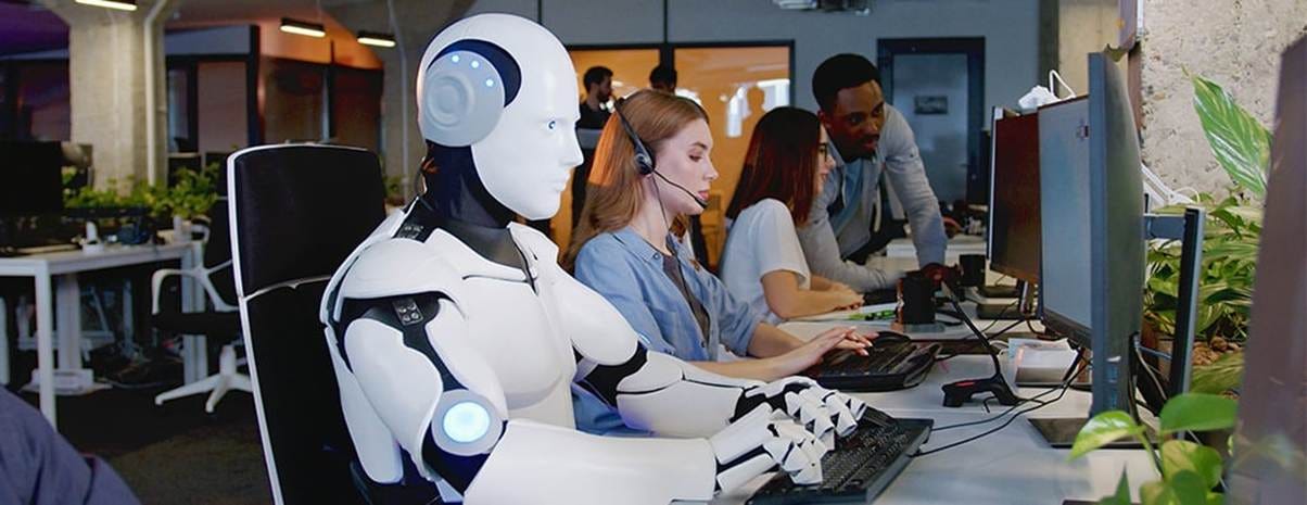 A group of people working on computers

AI-generated content may be incorrect.