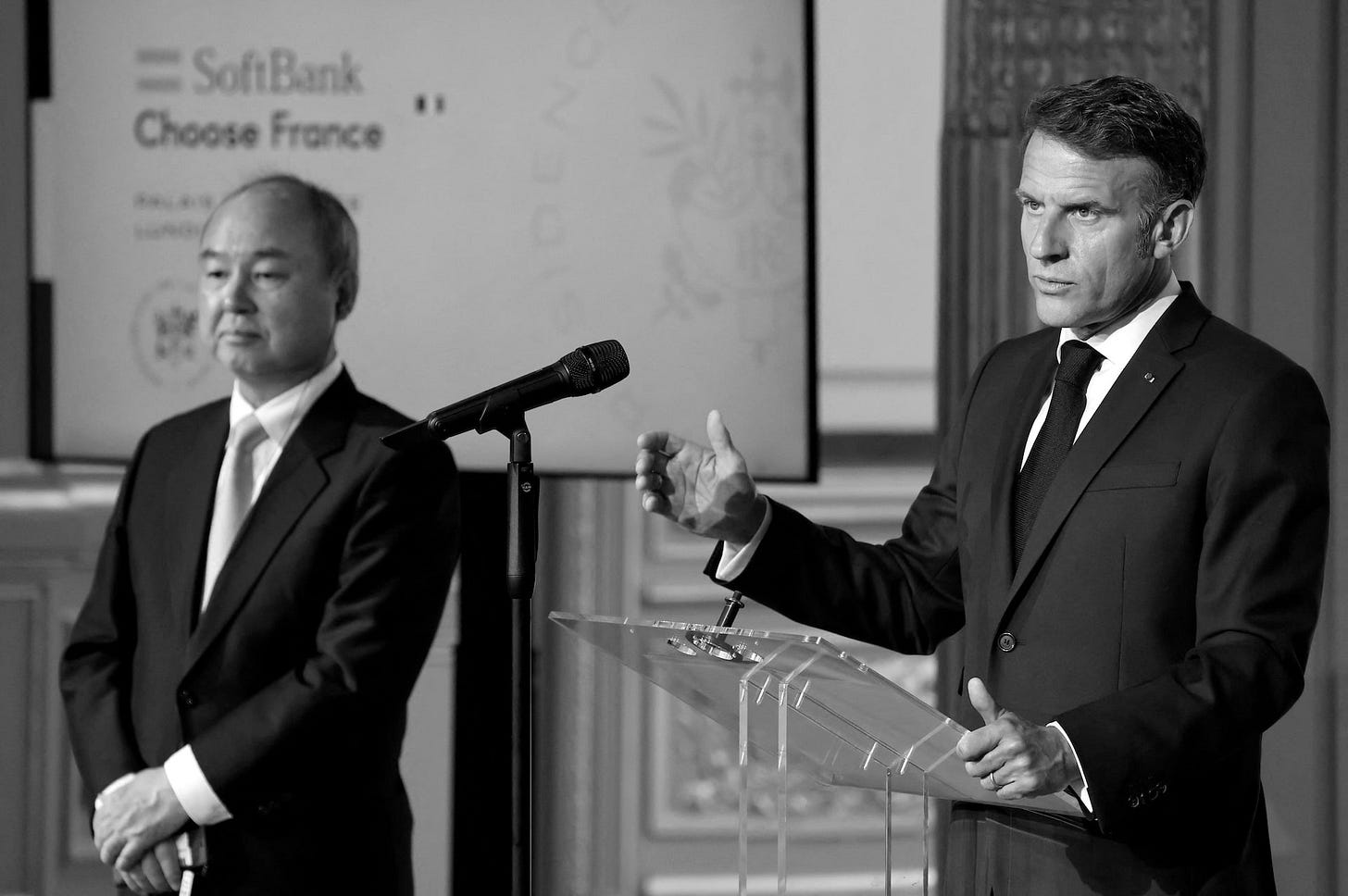 France's President Emmanuel Macron speaks next to SoftBank group Chairman and CEO Japanese Masayoshi Son during a joint statement on the day of a meeting at The Elysee Presidential Palace in Paris France's President Emmanuel Macron speaks next to SoftBank group Chairman and CEO Japanese Masayoshi Son during a joint statement on the day of a meeting at The Elysee Presidential Palace in Paris