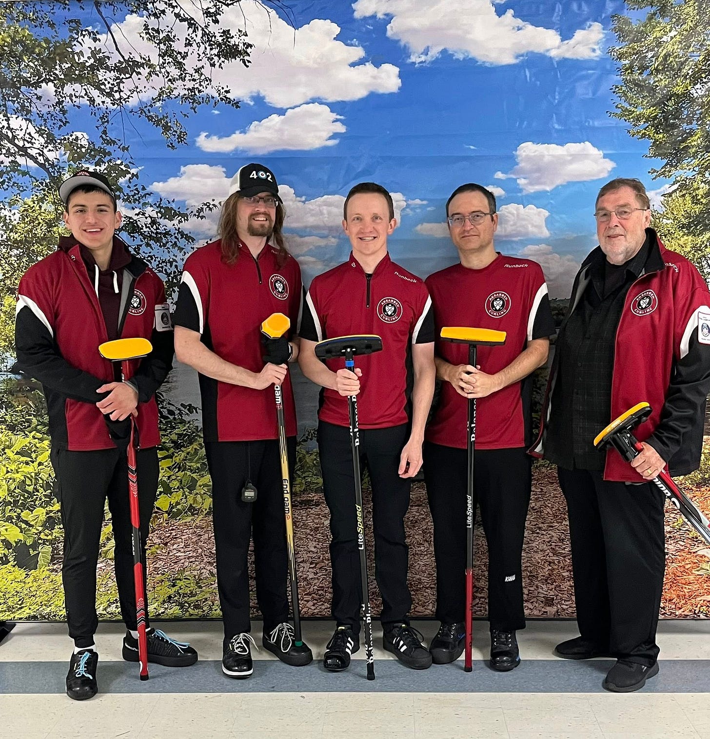 May be an image of 5 people, people golfing, track and field, dartboard and text May be an image of 5 people, people golfing, track and field, dartboard and text