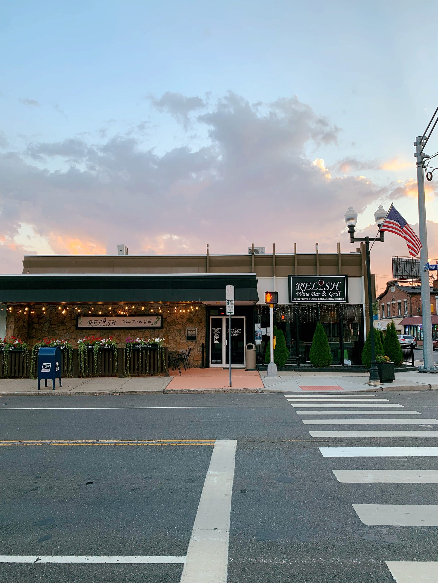 Restaurant with outdoor patio and sunset