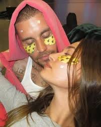 A close-up, candid-style photo of Hailey and Justin Bieber wearing Rhode blemish patches, highlighting skin texture and the shift toward visible acne care. A close-up, candid-style photo of Hailey and Justin Bieber wearing Rhode blemish patches, highlighting skin texture and the shift toward visible acne care.