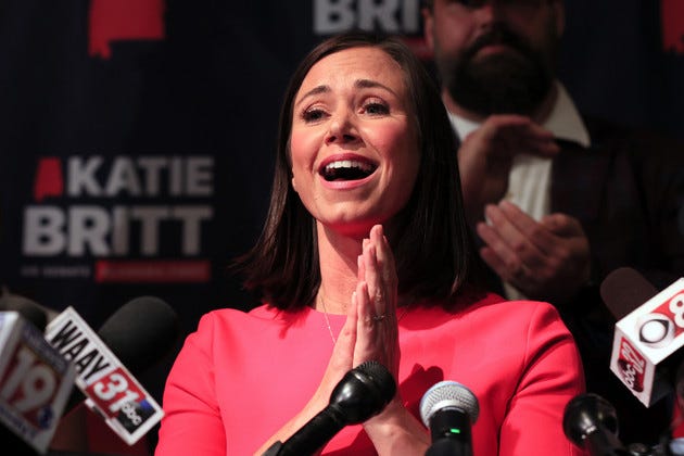 Republican Senate candidate Katie Britt talks to supporters. 