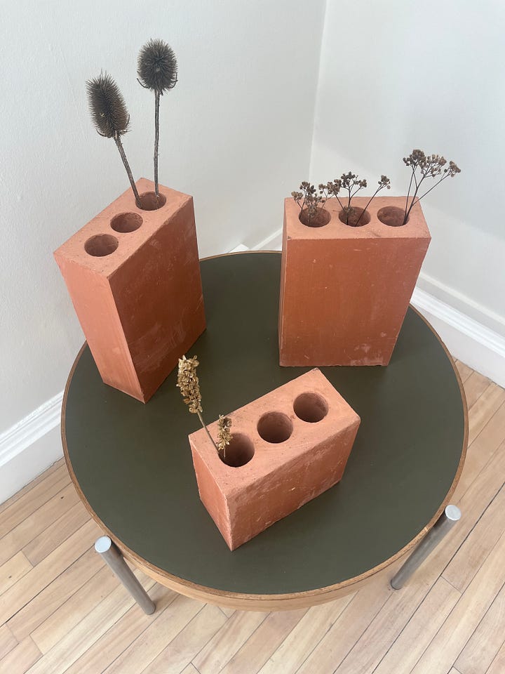 1. Adam Johnston + Raeburn Brick Limited -- Raeburn Vase / Scottish-sourced clay brick vases; 2. Eleanor White -- Quern / Lauriston Farm clay, mixed grog, Granton Rouge d’Ecosse wheat + Fulltofta Evolutionary Rye ash glaze with bushel of wheat.