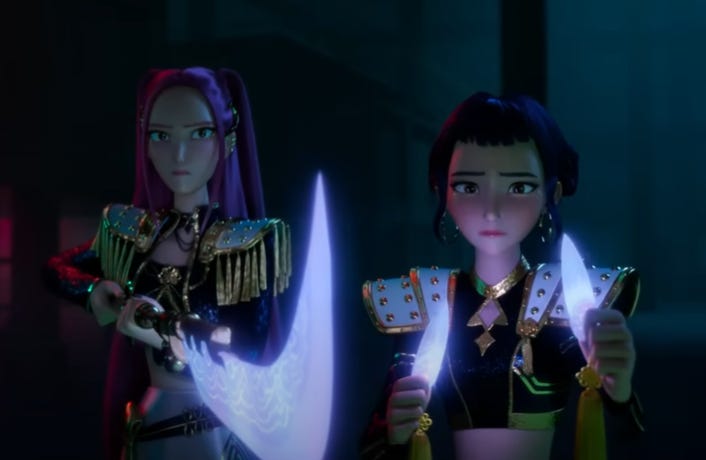 A still from KPop Demon Hunters, showing Huntrix members Mira and Zoe reluctantly wielding glowing weapons against their friend Rumi (not shown)