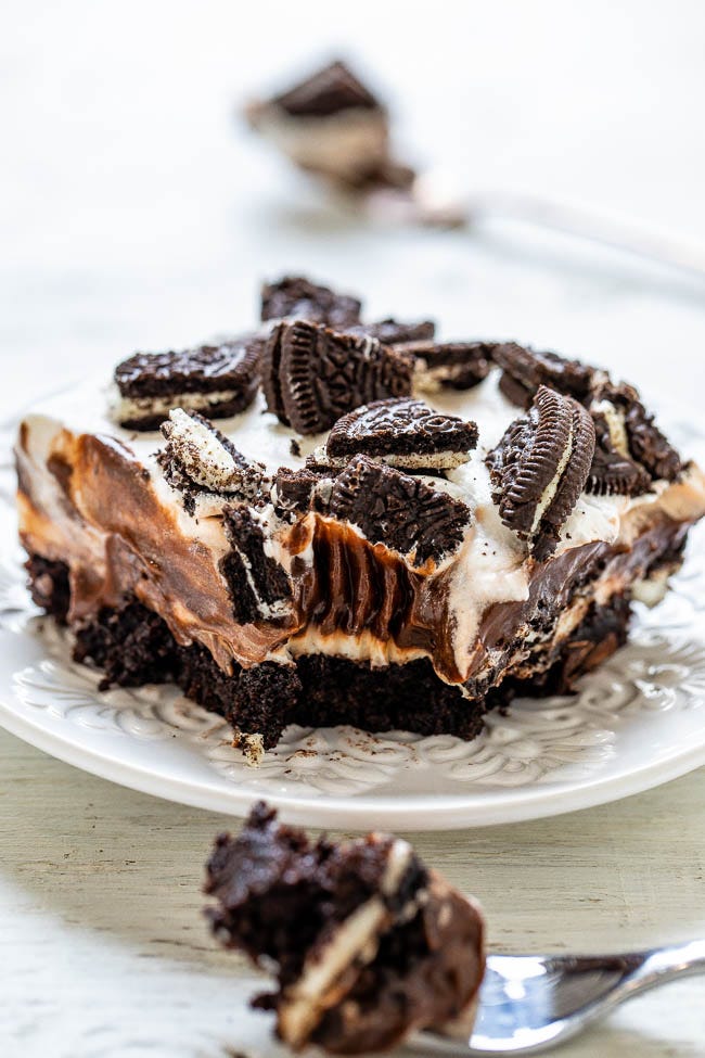 Oreo Brownie Lush - A rich and decadent dessert with fudgy brownies, cream cheese, chocolate pudding, whipped topping, and Oreo cookies!! EASY, great for parties, and it's a chocoholics dream!!ย Oreo Brownie Lush - A rich and decadent dessert with fudgy brownies, cream cheese, chocolate pudding, whipped topping, and Oreo cookies!! EASY, great for parties, and it's a chocoholics dream!!ย