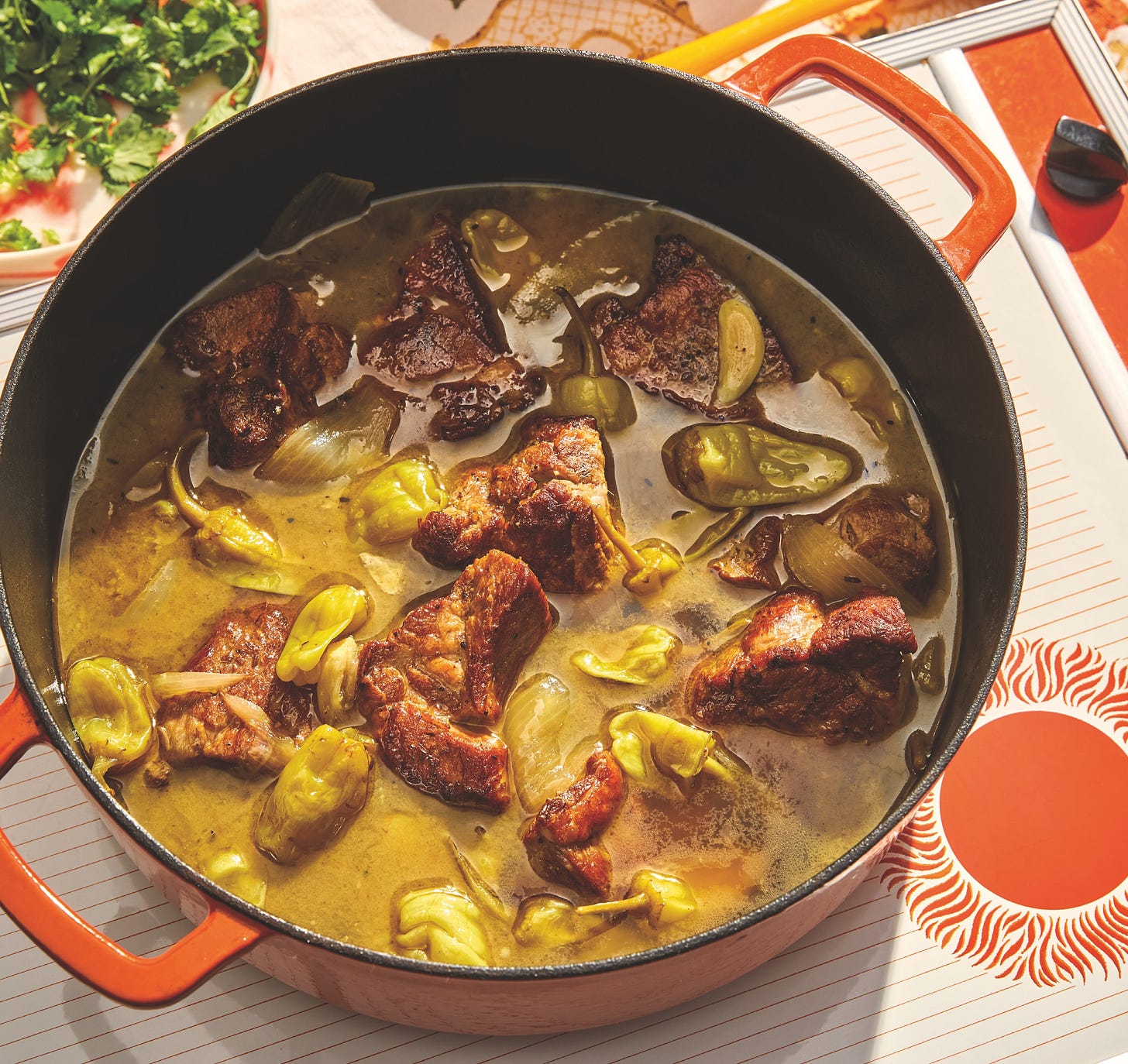 Pot of peperoncini braised pork from Christine Flynn's Easy Does It.