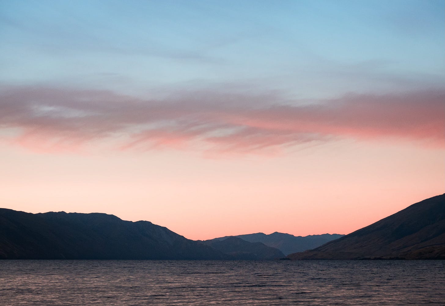 Body of Water With Mountains on Side Body of Water With Mountains on Side