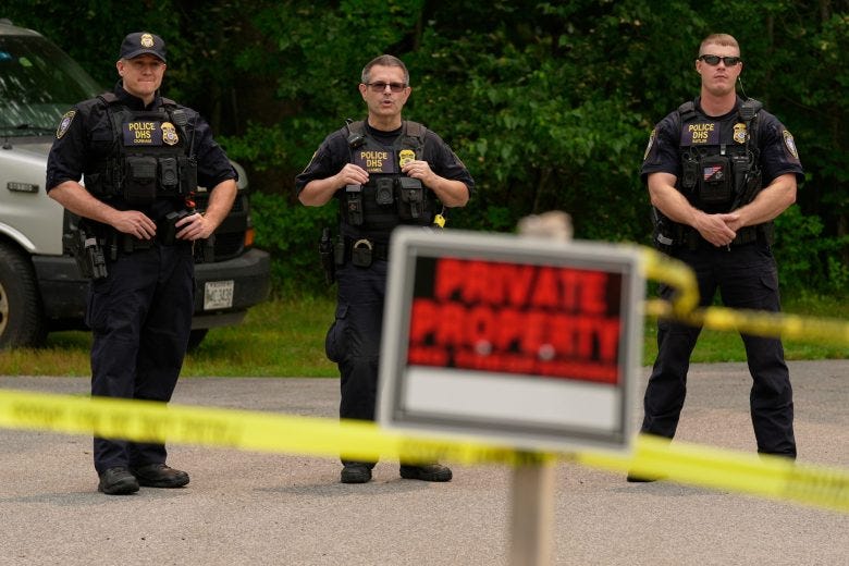 Federal agents stand outside a U.S. Immigration and Customs Enforcement facility Scarborough, Maine, one day after the shooting of Johan Sebastián Durán Guerrero, Tuesday, July 14, 2026.