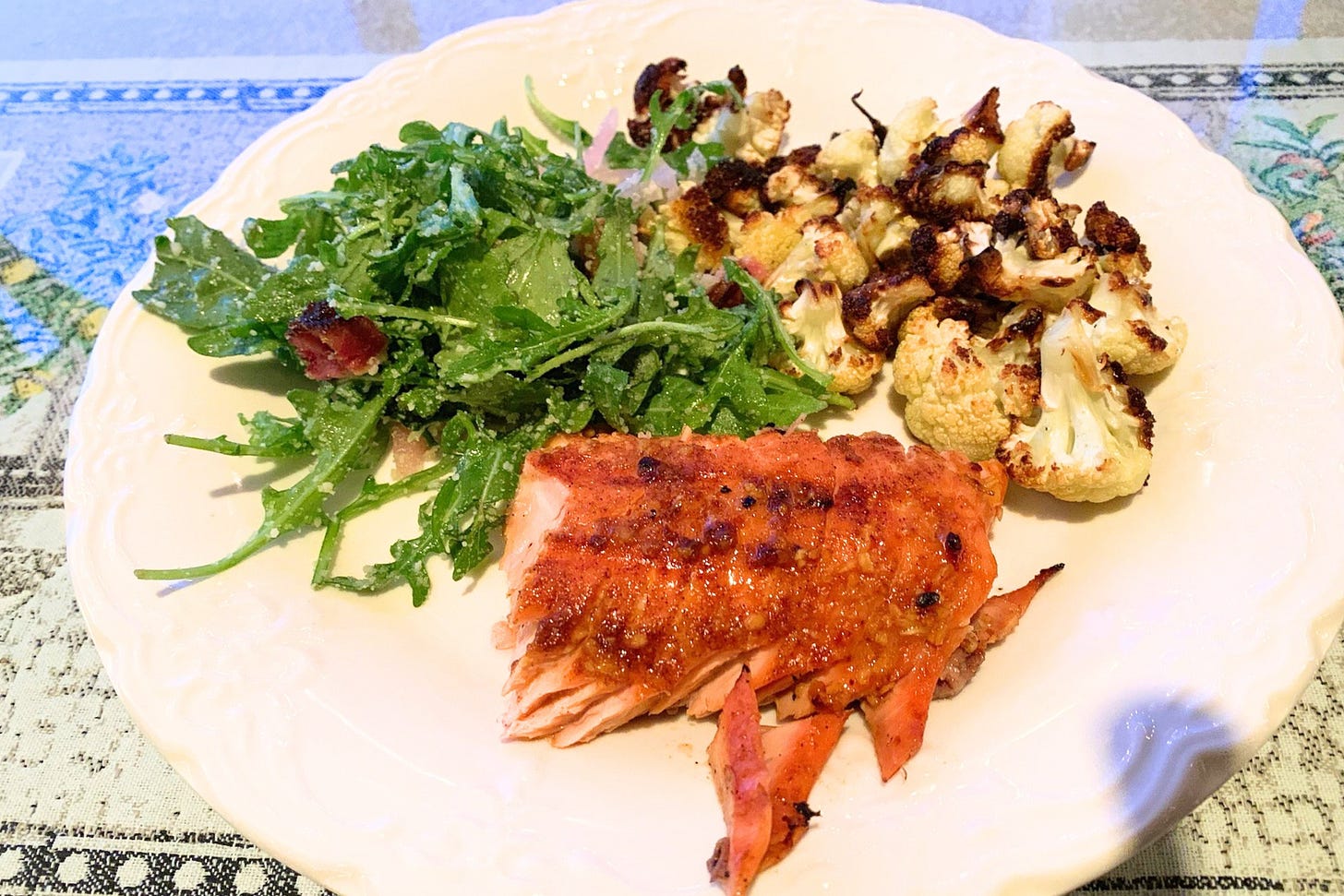 A plate with cooked salmon, roasted cauliflower, and fresh greens, representing a rich source of Omega‑3 polyunsaturated fats. Type Won Life™. A plate with cooked salmon, roasted cauliflower, and fresh greens, representing a rich source of Omega‑3 polyunsaturated fats. Type Won Life™.