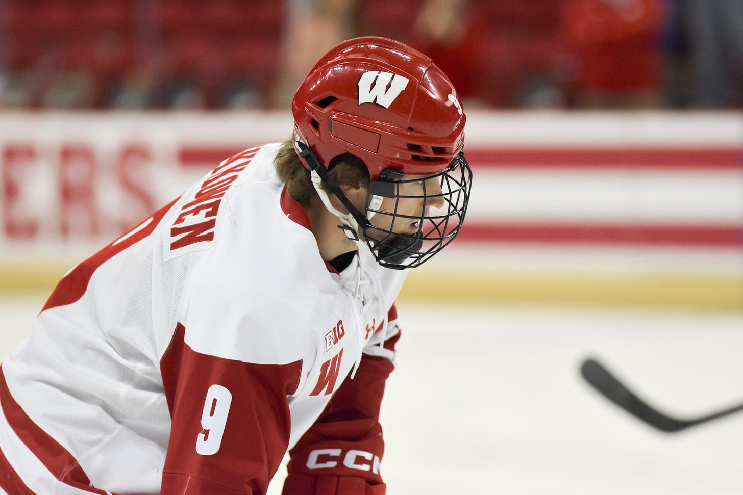 Kyle Kukkonen looks up with his stick just below the picture Kyle Kukkonen looks up with his stick just below the picture