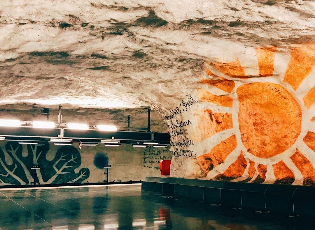 a picture of a sun on a wall in a building