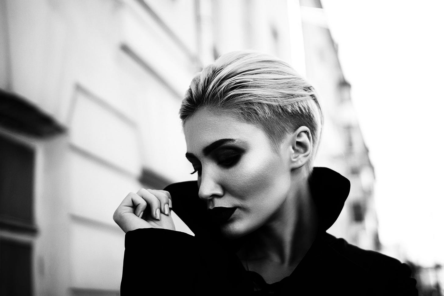 Beautiful model holding up her arm. 