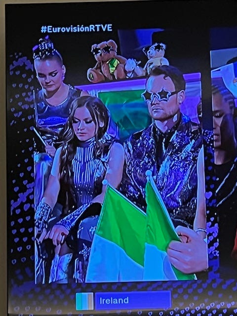 picture of TV screen showing Ireland entrants in Eurovision singing contest processing their loss.