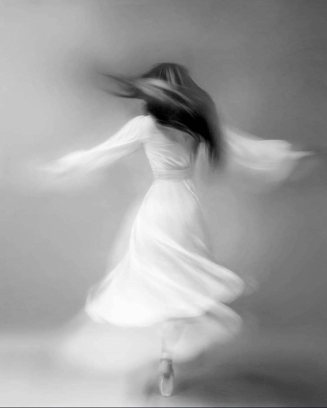 May be a black-and-white image of dancing May be a black-and-white image of dancing