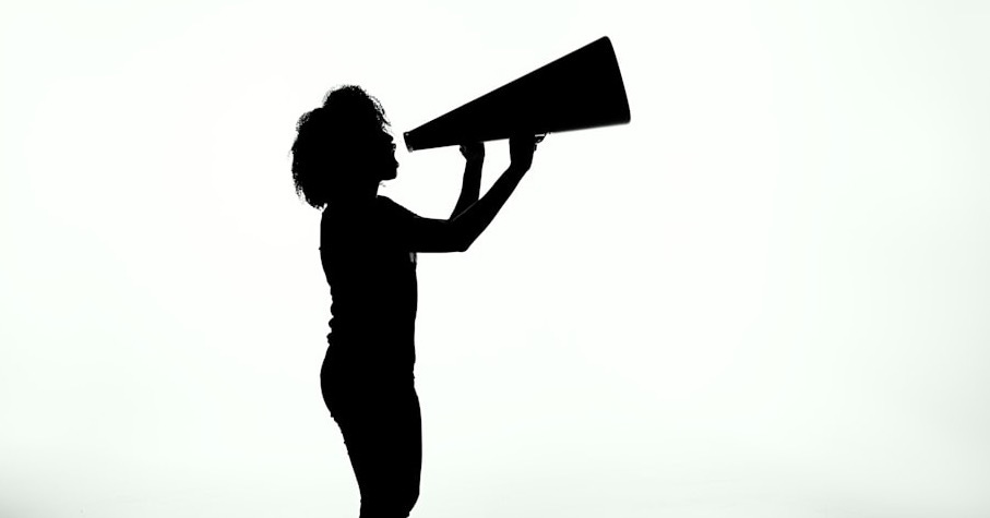 silhouette of woman holding rectangular board silhouette of woman holding rectangular board
