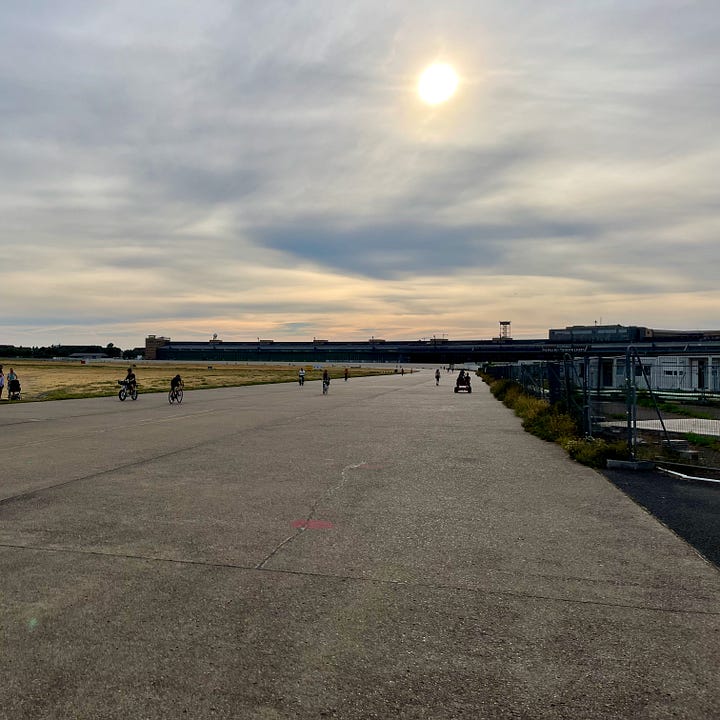photographs of Tempelhof Airport park in the summer evening