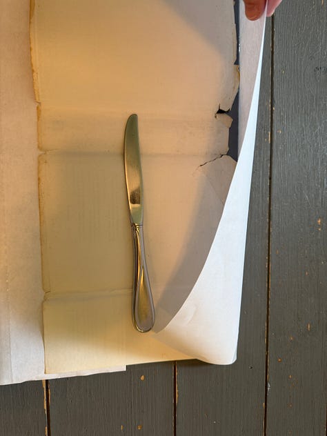 Steps 1-9 described below for how to wrap the Three Cities of Bells dust jacket in a mylar cover