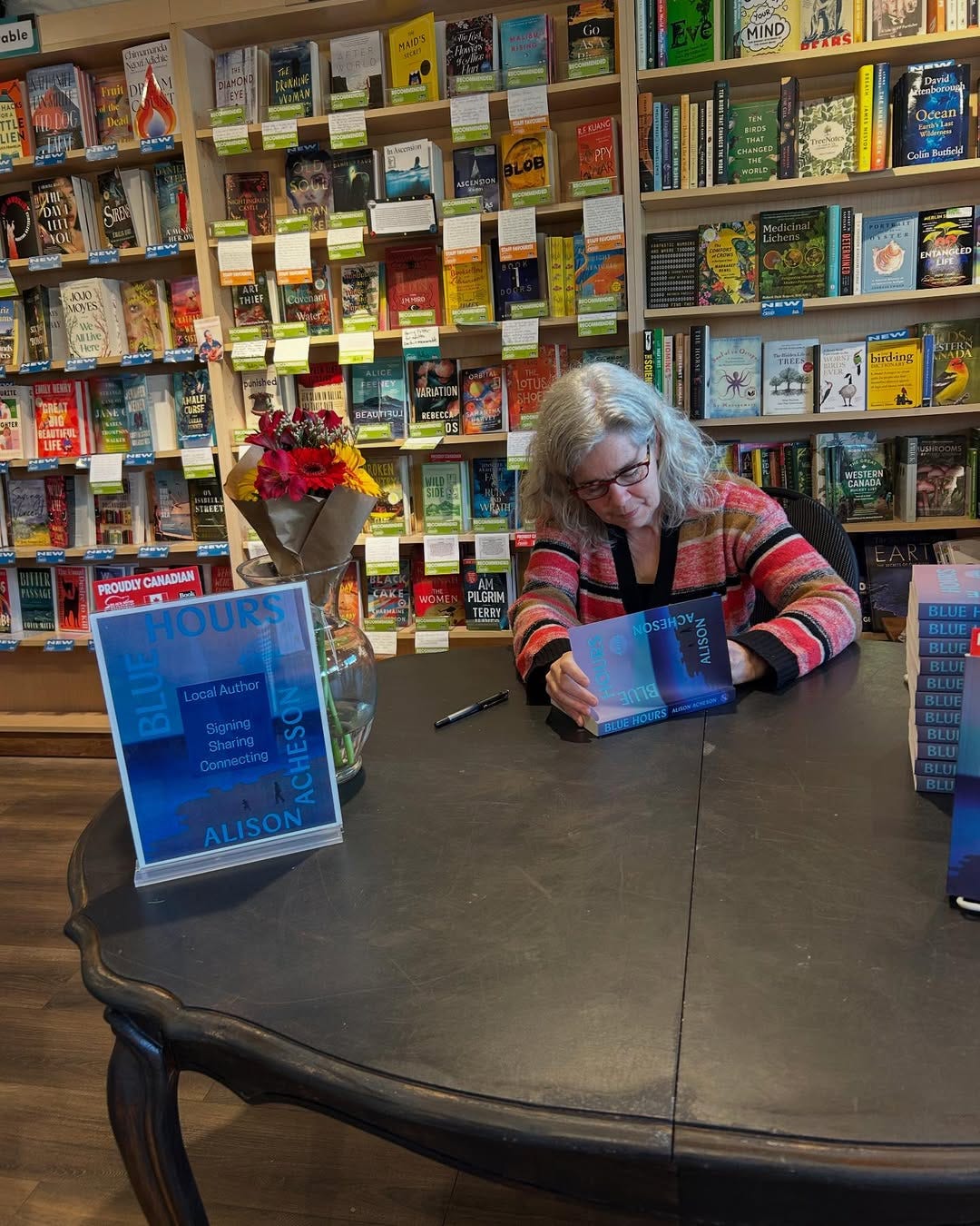 May be an image of 1 person, newsstand and text