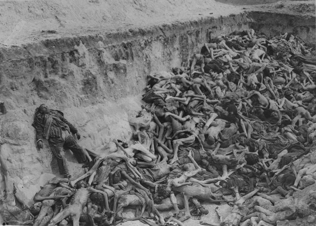 Gruesome photo of skeletal bodies in a pit, not yet covered by bulldozers