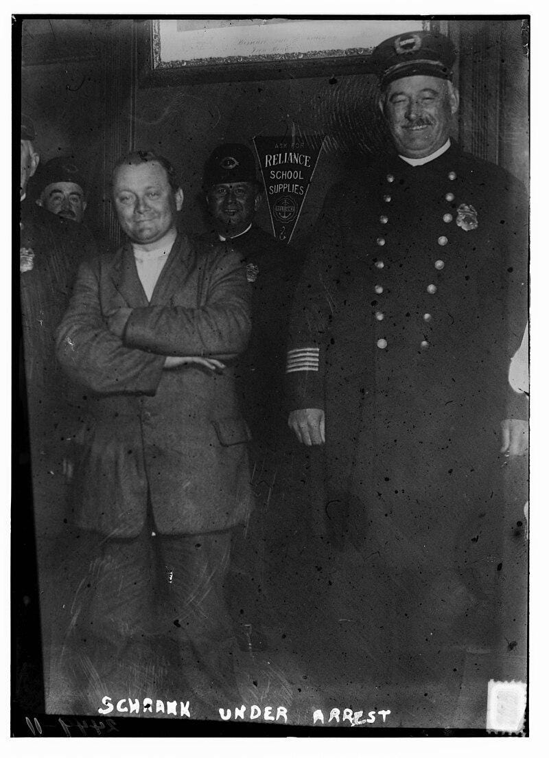 John Schrank under arrest in Milwaukee, 1912, after his failed assassination attempt on former President Theodore Roosevelt.
