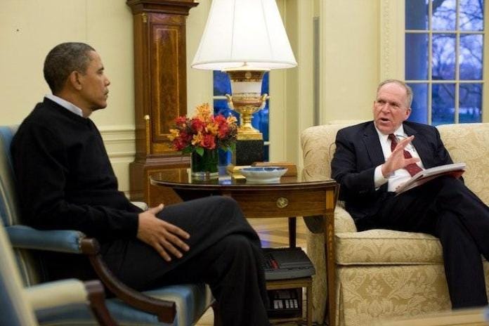 Image may contain John O. Brennan Furniture Chair Human Person Sitting Plant Lamp and Table Lamp Image may contain John O. Brennan Furniture Chair Human Person Sitting Plant Lamp and Table Lamp