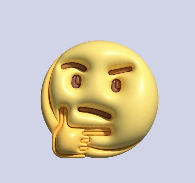 a gold emotiction of a smiley face