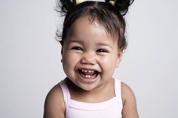 baby girl (6-9 months) laughing, portrait - baby laughing stock pictures, royalty-free photos & images