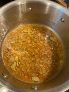 cooking the herbs and onions