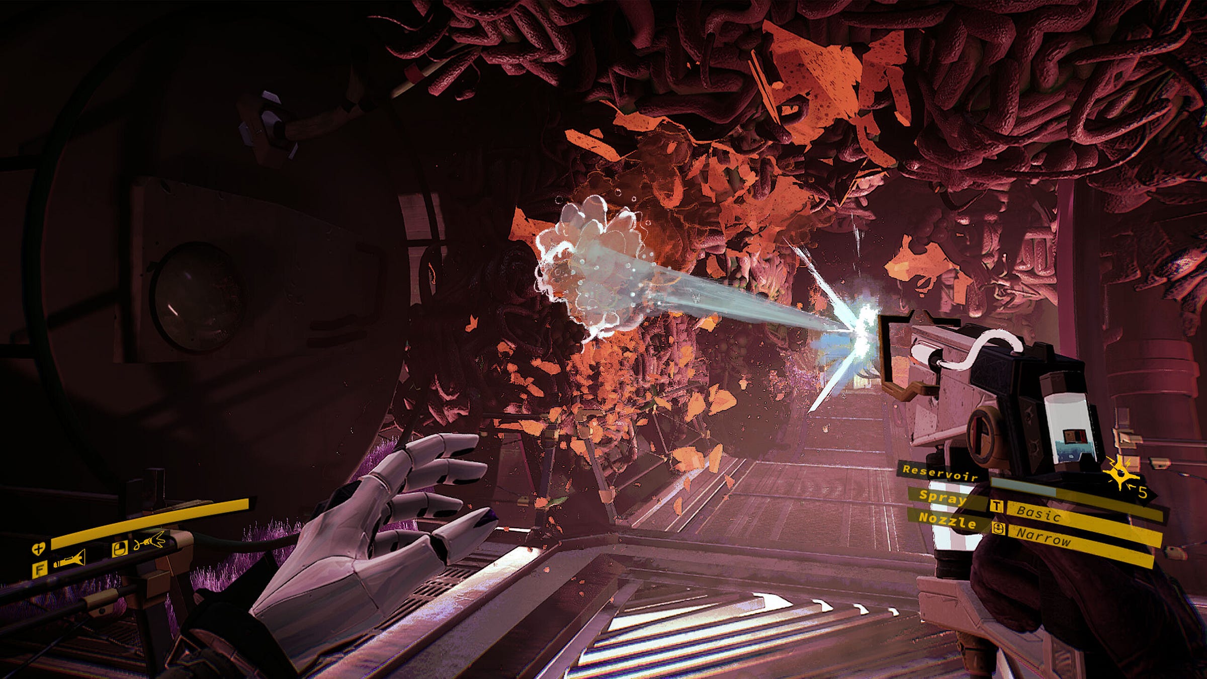 Video game screenshot that shows the first-person view of a woman shooting a spray of water and fungus that is covering the walls and ceiling of a metallic space base.