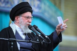 In this photo released by an official website of the office of the Iranian supreme leader, Supreme Leader Ayatollah Ali Khamenei speaks in a meeting, in Tehran, Iran, Saturday, Jan. 17, 2026. (Office of the Iranian Supreme Leader via AP)