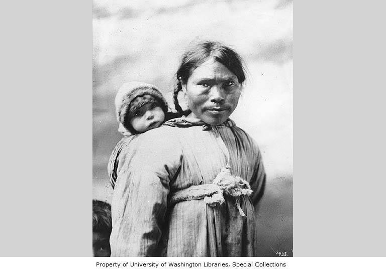 Alaska Native and her infant. Alaska Native and her infant.