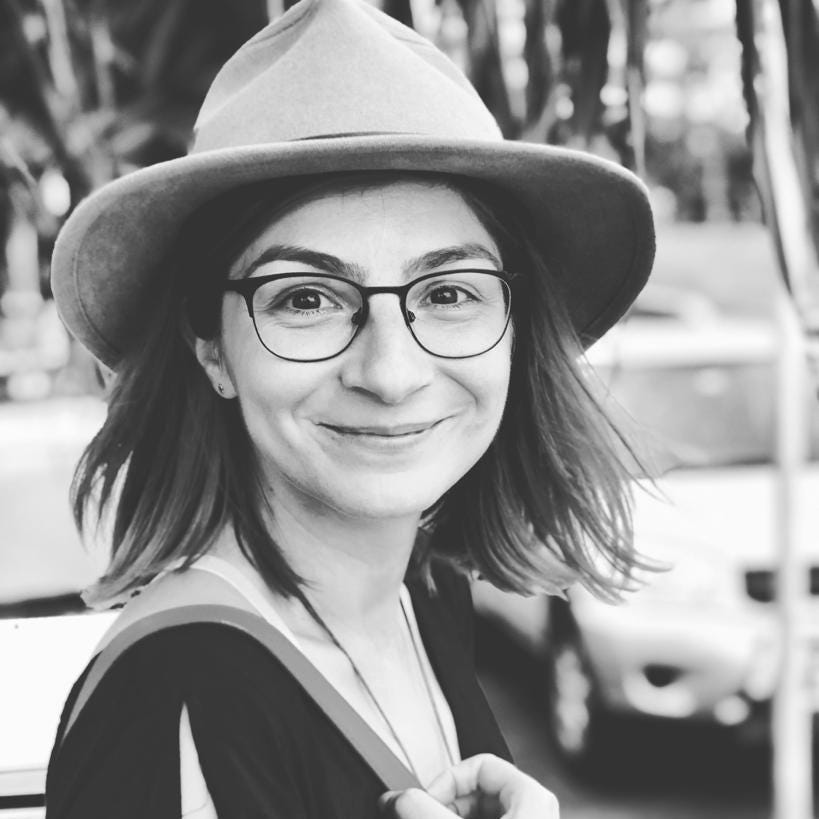 A person wearing glasses and a hat

AI-generated content may be incorrect.