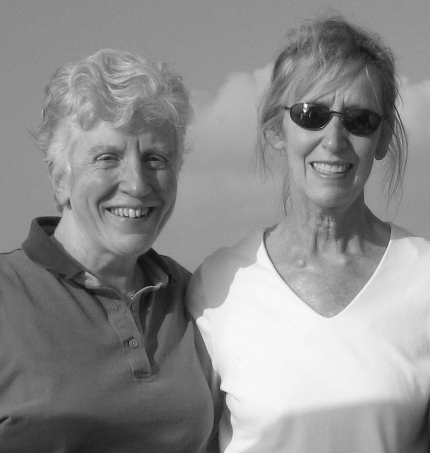 Two women smiling