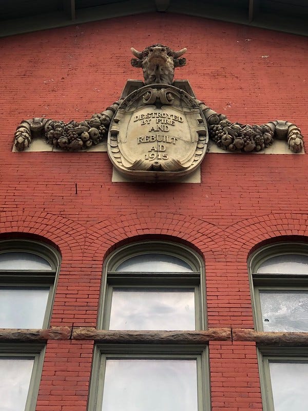 Destroyed by fire and rebuilt 1915 sign