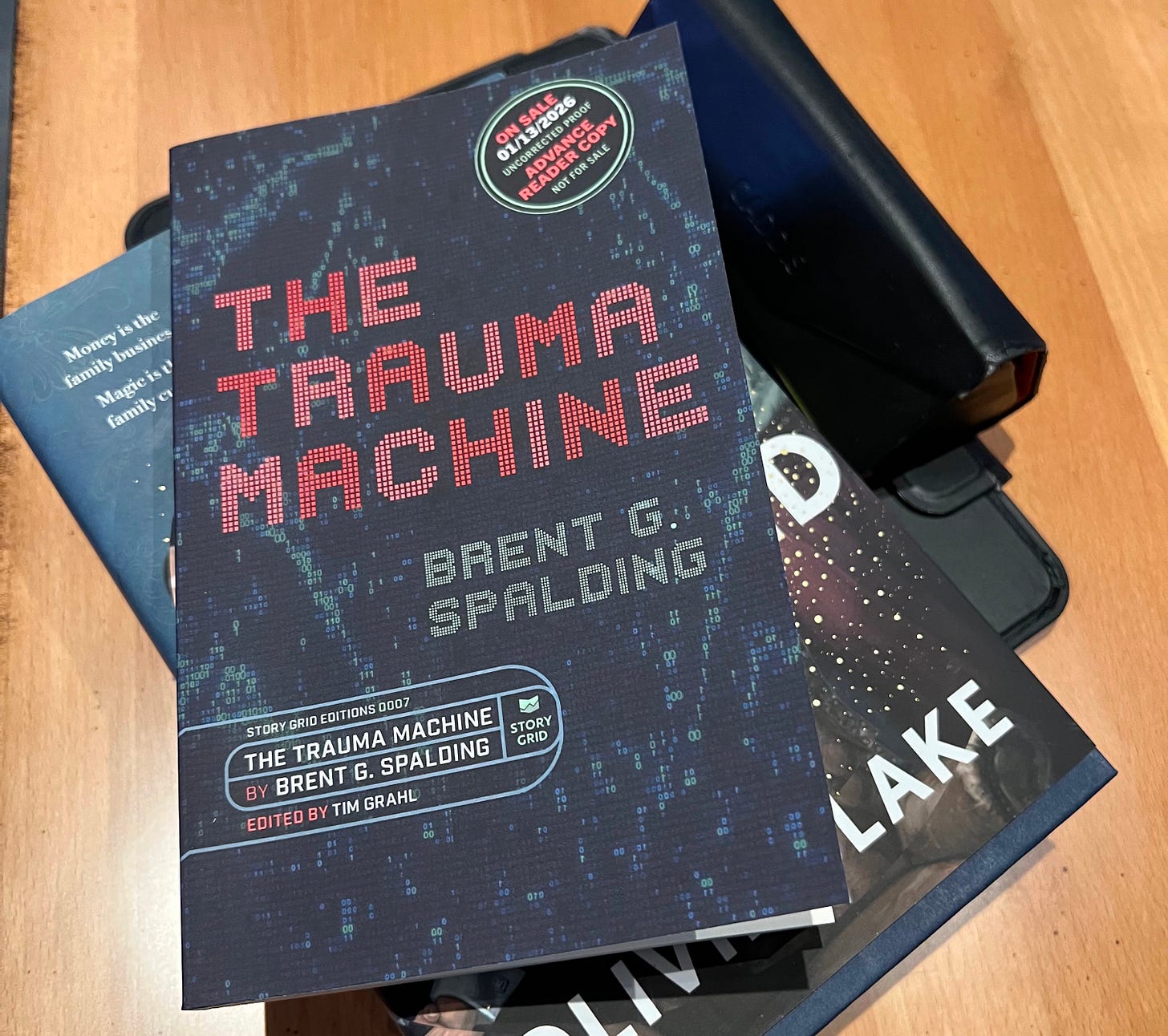 The Trauma Machine by Brent Spalding (and my reading glasses) The Trauma Machine by Brent Spalding (and my reading glasses)