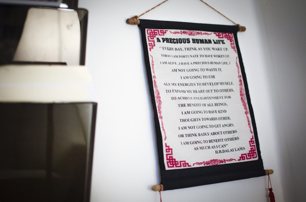 Words from the Dalai Lama adorn the wall at PSOT