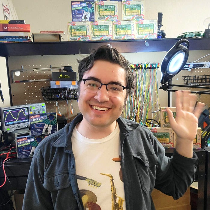 David Levi, owner of MicroKits, waving.