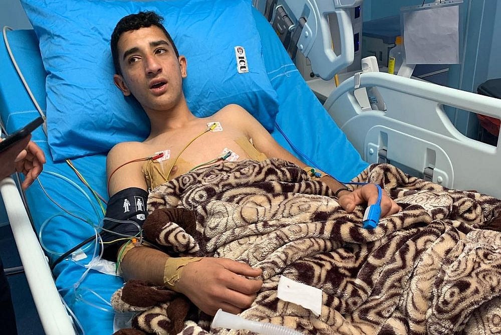 Muhammad Ghunaimat in Al-Ahly Hospital, Hebron, occupied West Bank, April 24, 2022. (Basil al-Adraa) Muhammad Ghunaimat in Al-Ahly Hospital, Hebron, occupied West Bank, April 24, 2022. (Basil al-Adraa)