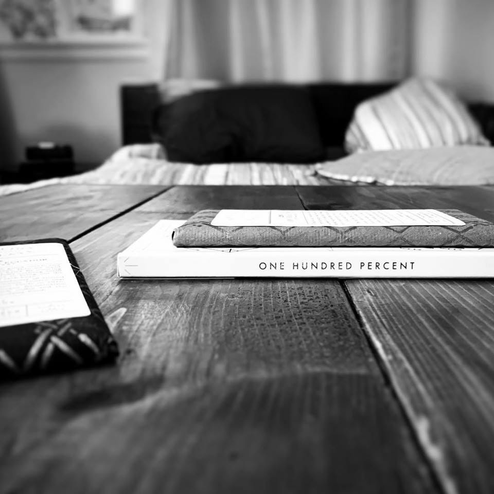 100% dark chocolate bar on a table in black and white
