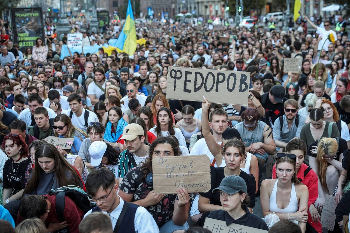 Thousands take to Kyiv's main street, firm on calls for defense minister's  return - The Japan Times