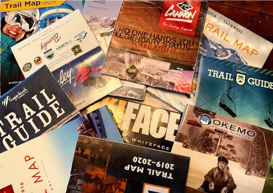 Pile of ski maps Pile of ski maps