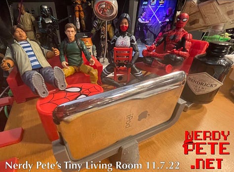 Various action figures from my collection lounging in a 3d printed living room with hard wood floors (it's actually my wood-grain desktop).