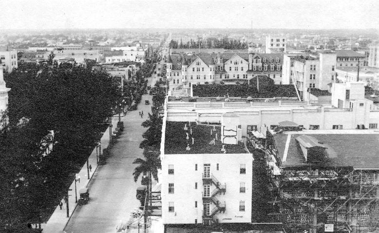 Figure 3: Flagler Street Looking West from NE Third Avenue in 1922. Calumet Building in the foreground Figure 3: Flagler Street Looking West from NE Third Avenue in 1922. Calumet Building in the foreground