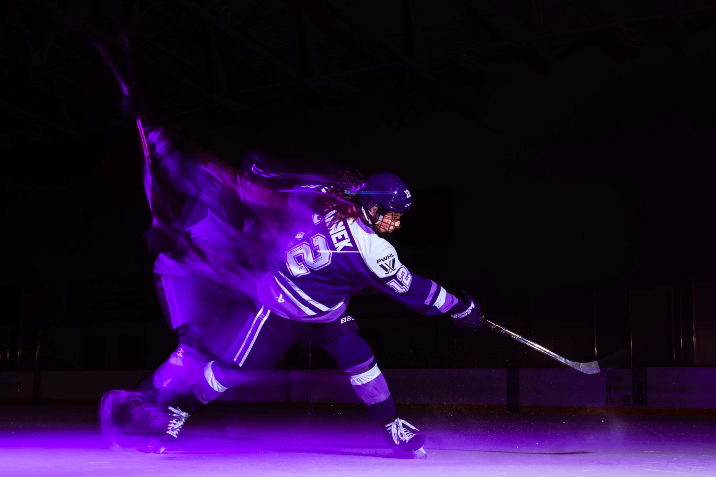 Blurred Kelly Pannek shooting.