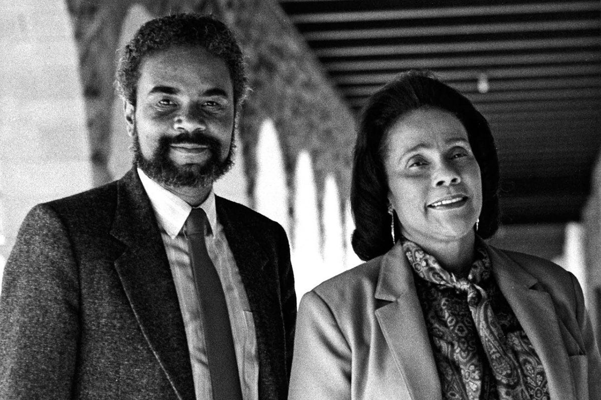Black and white photo of a young Dr. Carson standing side by side with Coretta Scott King at Stanford University.