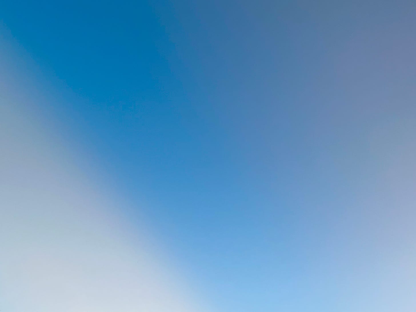 Picture of blue sky with cloud edges