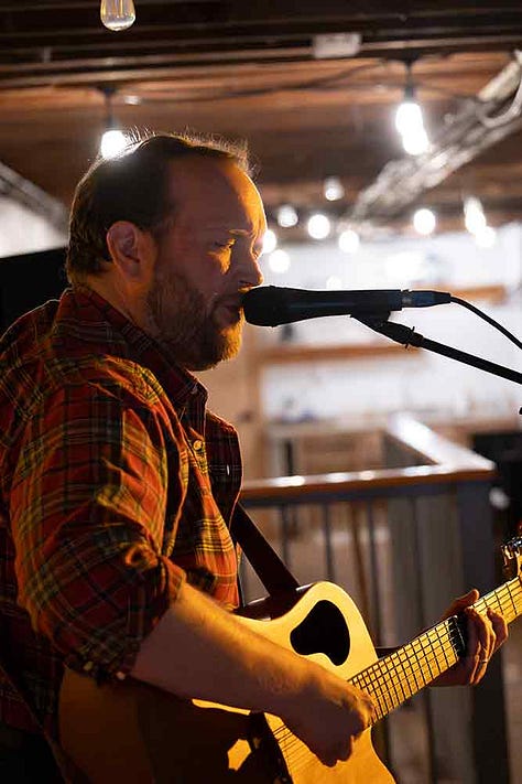 Clint Vines, Colton Sanders, and Jay Burnam perform in the loft at Iron Society, July 25th, 2025