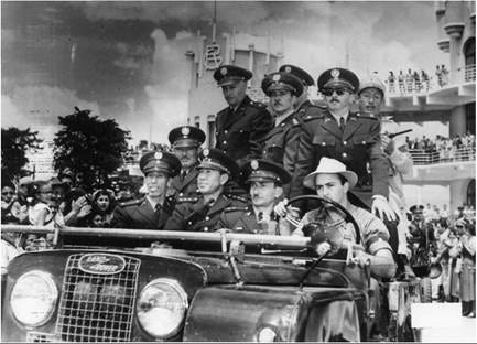Castillo Armas and he Guatemalan military junta driving into Guatemala City after their victory