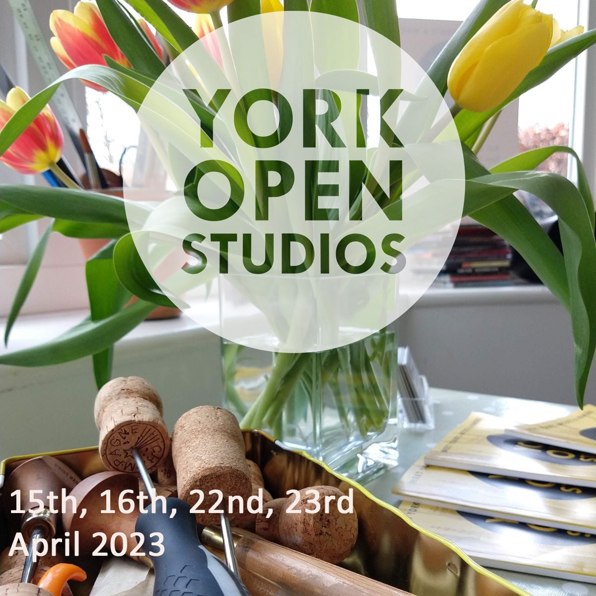 A box of printmaking tools, in front of a vase of tulips. York Open Studios directories are to one side. The image is overlaid with the YOS logo and the dates 15th, 16th, 22nd, 23rd April 2023